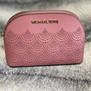Authentictic Michael Kors Clutch with care card. Never used